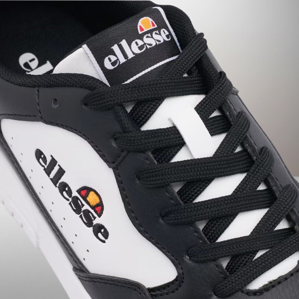 Zapatillas Ellesse Momento negro y blanco talla 42 detalle del logo y materiales