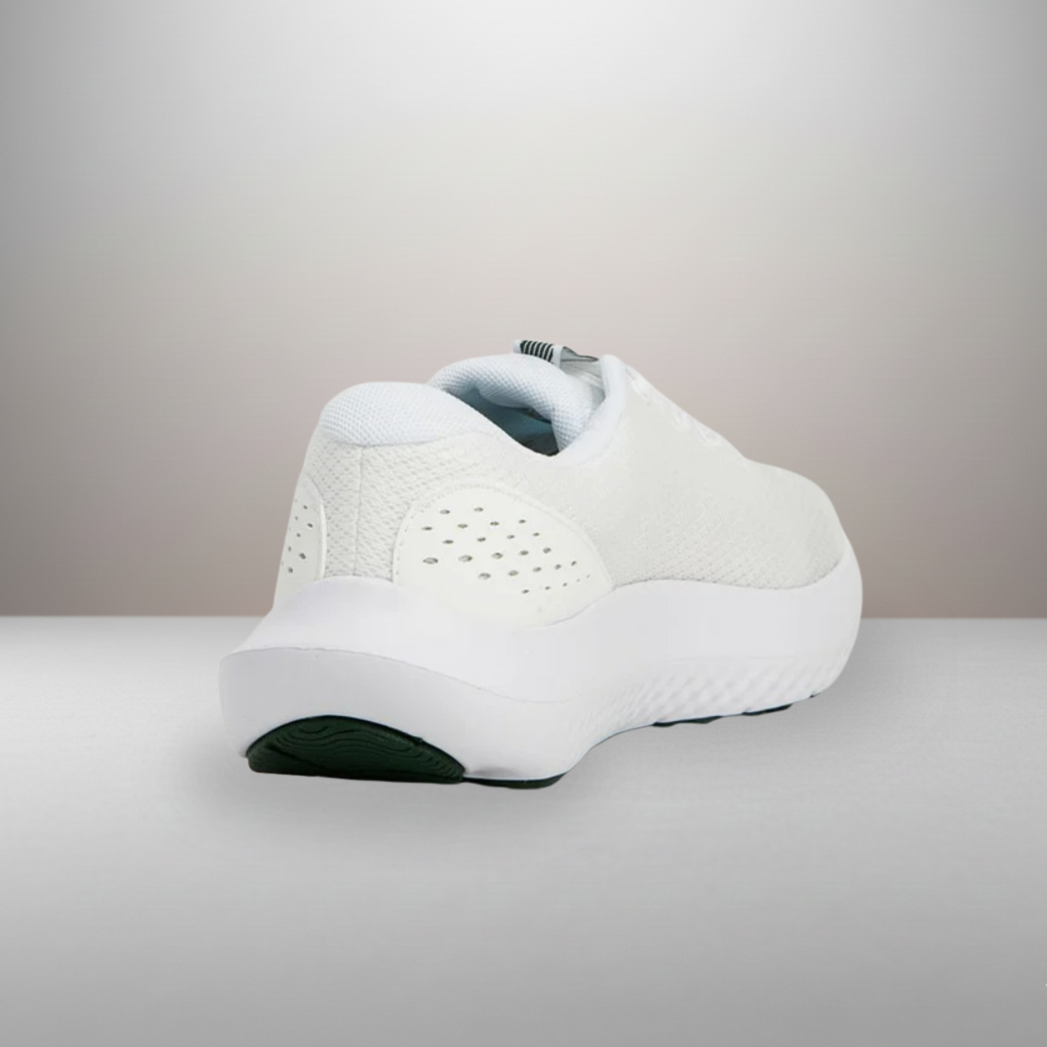 Zapatillas Under Armour Charged Surge 4 blanco talla 42 vista trasera del refuerzo del talón